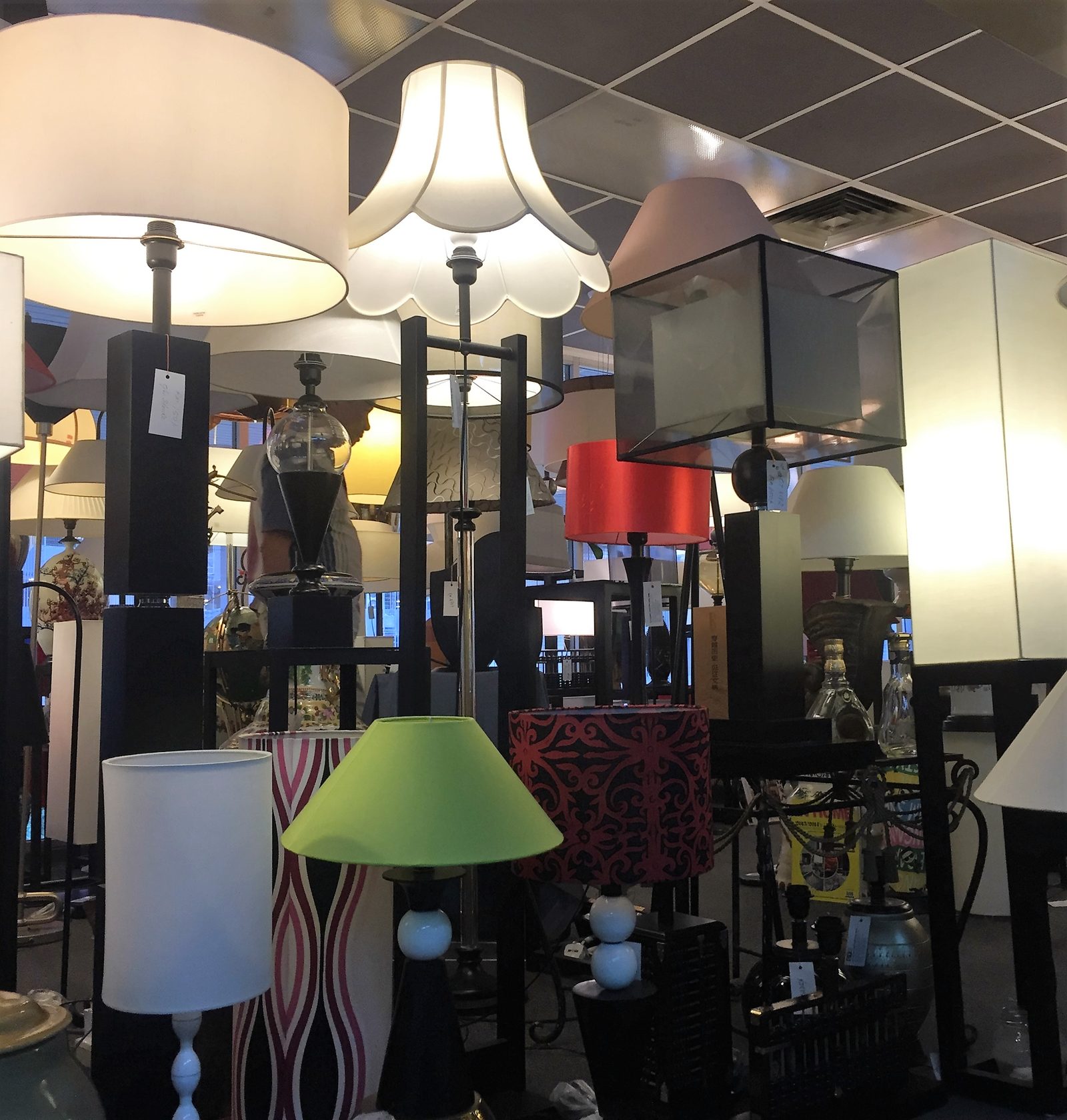 A mixed group of differently shaped table lamps
