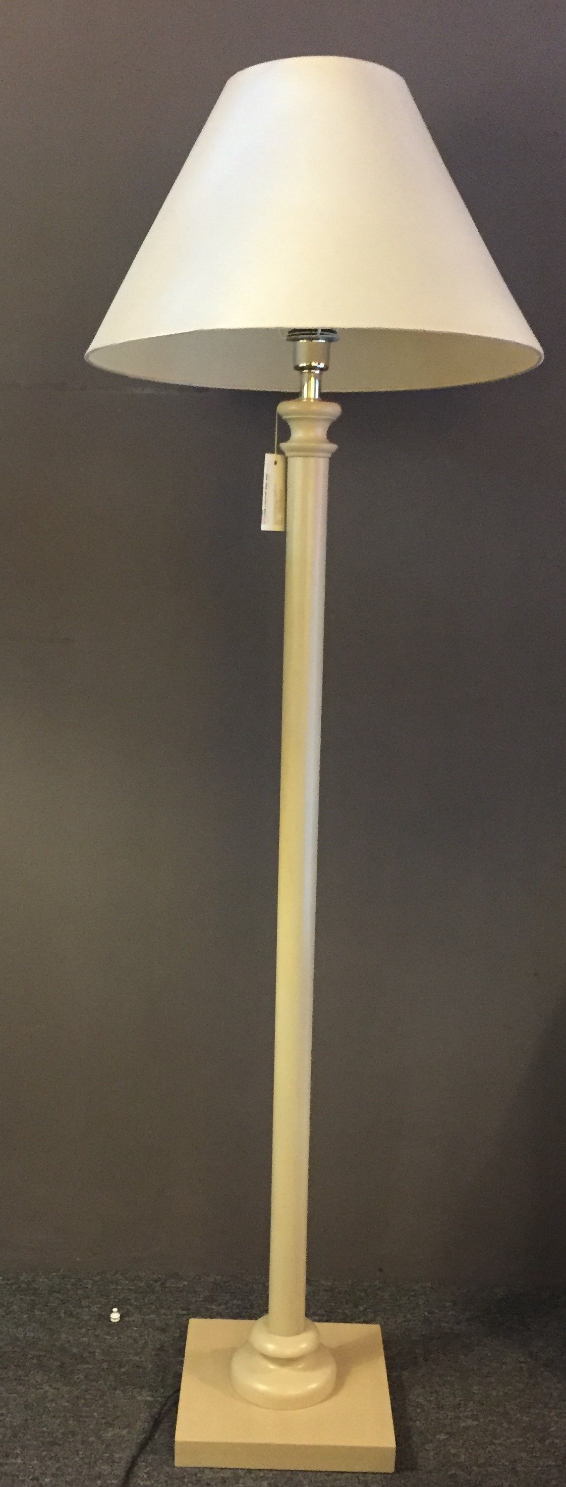 Floor lamp with a wide drum shade