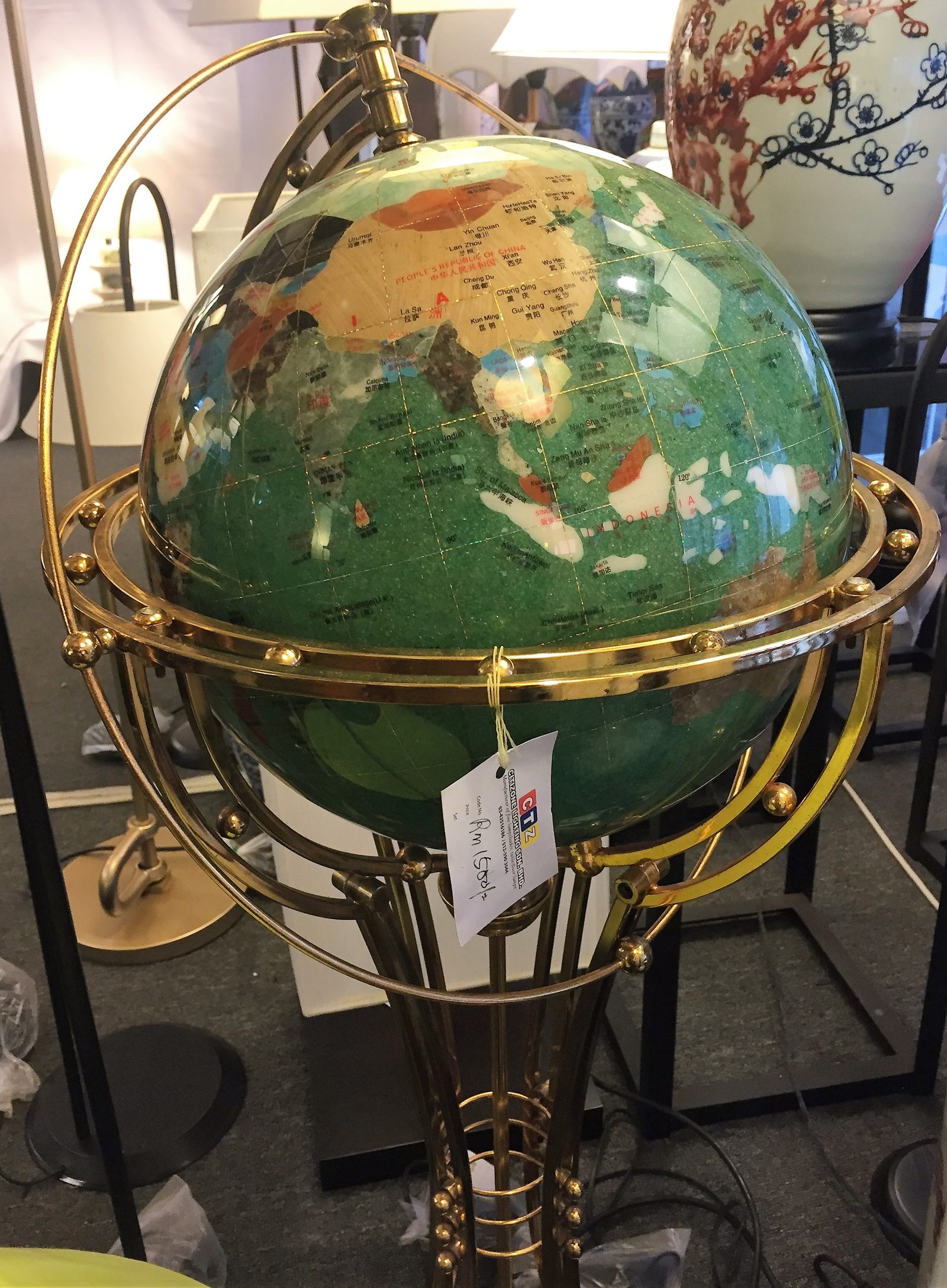 Round globe-shaped lampshade lit from within